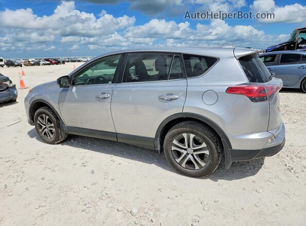JTMZFREV0JJ198217 2018 TOYOTA RAV4 Silver Հետևի ձախ