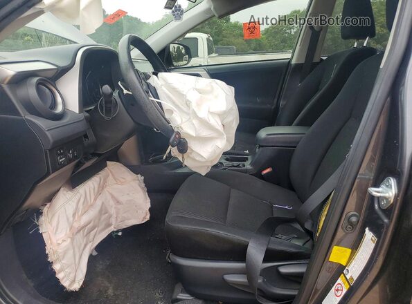 JTMZFREV0JJ751481 2018 TOYOTA RAV4 Charcoal Front interior view
