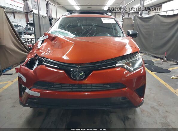 JTMZFREV1GJ089869 2016 TOYOTA RAV4 Orange Instrument cluster view