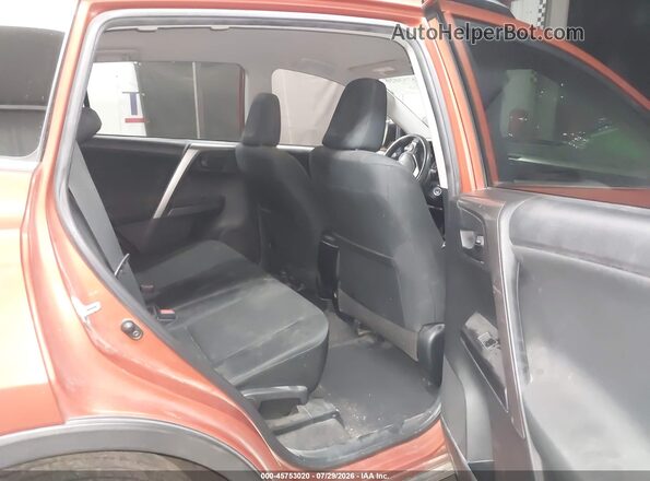 JTMZFREV1GJ089869 2016 TOYOTA RAV4 Orange VIN sticker view