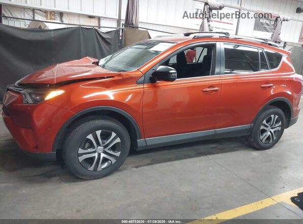 JTMZFREV1GJ089869 2016 TOYOTA RAV4 Orange 360 interior view