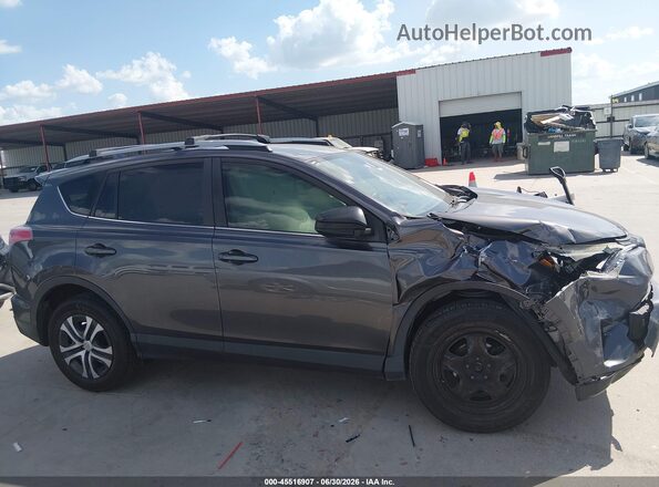 JTMZFREV1HJ712067 2017 TOYOTA RAV4 Gray Widok wnętrza z tyłu