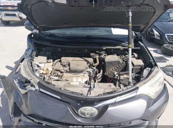 JTMZFREV1HJ712067 2017 TOYOTA RAV4 Gray Widok z tyłu