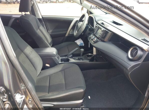 JTMZFREV1JJ731076 2018 TOYOTA RAV4 Gray წინა სალონის ხედი