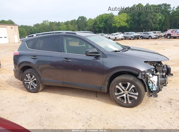 JTMZFREV1JJ731076 2018 TOYOTA RAV4 Gray უკანა სალონის ხედი
