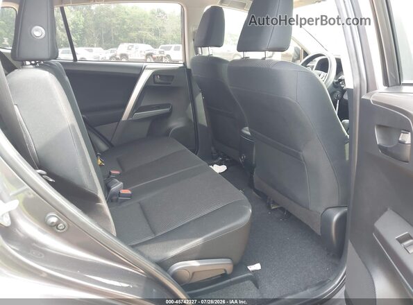 JTMZFREV1JJ731076 2018 TOYOTA RAV4 Gray VIN კოდის სტიკერის ხედი