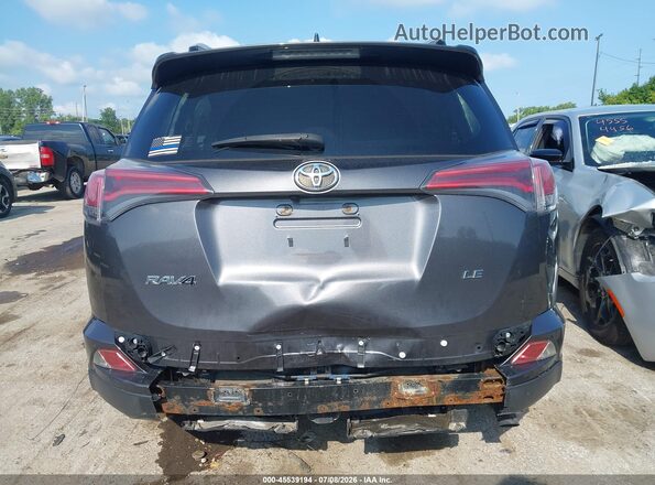 JTMZFREV2GJ079626 2016 TOYOTA RAV4 Gray 