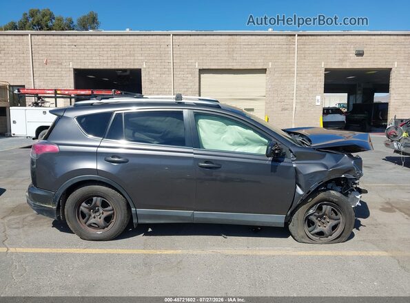 JTMZFREV3GJ091431 2016 TOYOTA RAV4 Gray Widok wnętrza z tyłu