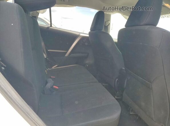 JTMZFREV3HJ142542 2017 TOYOTA RAV4 White Vista interior trasera