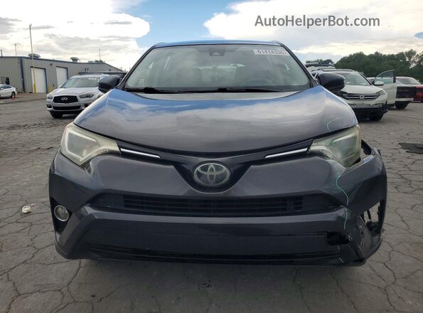 JTMZFREV3HJ722275 2017 TOYOTA RAV4 Gray Вид спереду