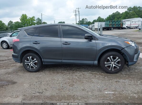 JTMZFREV3JJ150596 2018 TOYOTA RAV4 Gray Vista interior trasera