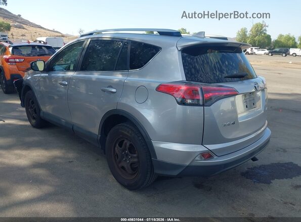 JTMZFREV3JJ173263 2018 TOYOTA RAV4 Silver Հետևի ձախ