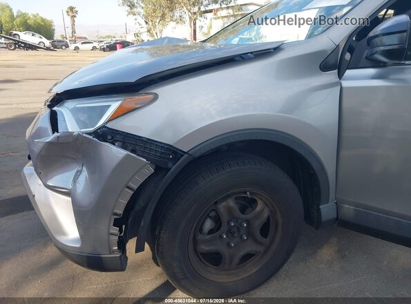 JTMZFREV3JJ173263 2018 TOYOTA RAV4 Silver Դիմացի տեսք