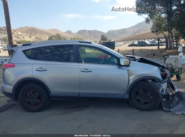 JTMZFREV3JJ173263 2018 TOYOTA RAV4 Silver Սալոնի հետևի տեսք