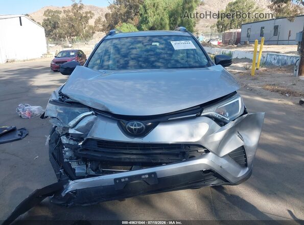JTMZFREV3JJ173263 2018 TOYOTA RAV4 Silver Սարքավորումների վահանակի տեսք
