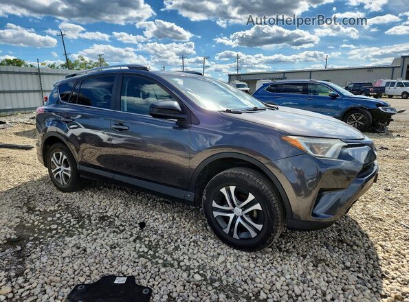 JTMZFREV3JJ185574 2018 TOYOTA RAV4 Gray Front right