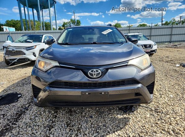 JTMZFREV3JJ185574 2018 TOYOTA RAV4 Gray Front view