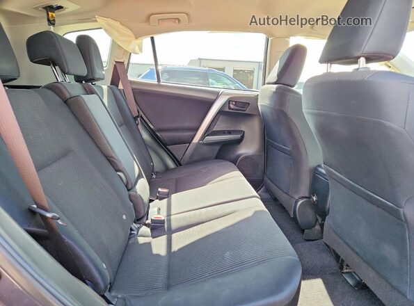 JTMZFREV3JJ185574 2018 TOYOTA RAV4 Gray Rear interior view
