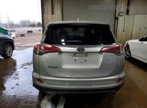 JTMZFREV3JJ195781 2018 TOYOTA RAV4 Silver უკანა ხედი