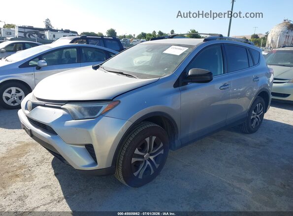 JTMZFREV4JJ199774 2018 TOYOTA RAV4 Gray Front left