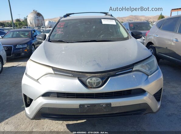 JTMZFREV4JJ199774 2018 TOYOTA RAV4 Gray Rear interior view