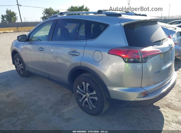 JTMZFREV4JJ199774 2018 TOYOTA RAV4 Gray Rear left