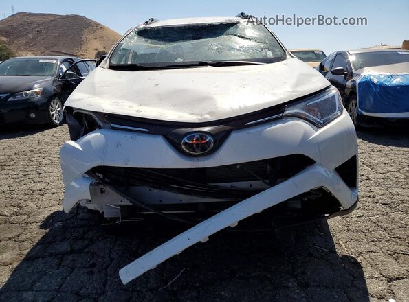 JTMZFREV4JJ747806 2018 TOYOTA RAV4 White Front view