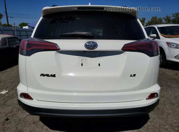 JTMZFREV4JJ747806 2018 TOYOTA RAV4 White Rear view