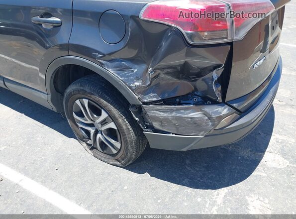 JTMZFREV6GJ095814 2016 TOYOTA RAV4 Gray Вид спереду