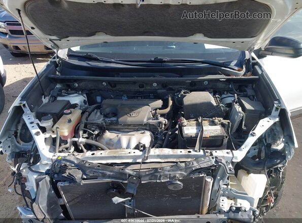 JTMZFREV6JJ729629 2018 TOYOTA RAV4 White Rear view