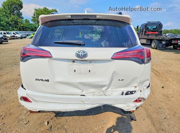 JTMZFREV7GD088501 2016 TOYOTA RAV4 White Rear view