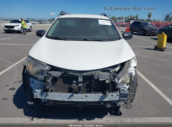 JTMZFREV7HJ712736 2017 TOYOTA RAV4 White Rear interior view