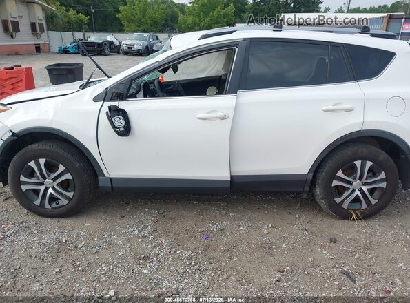 JTMZFREV7JJ207821 2018 TOYOTA RAV4 White Vista interior trasera