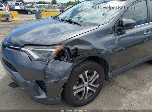 JTMZFREV8GJ077850 2016 TOYOTA RAV4 Gray Widok z przodu