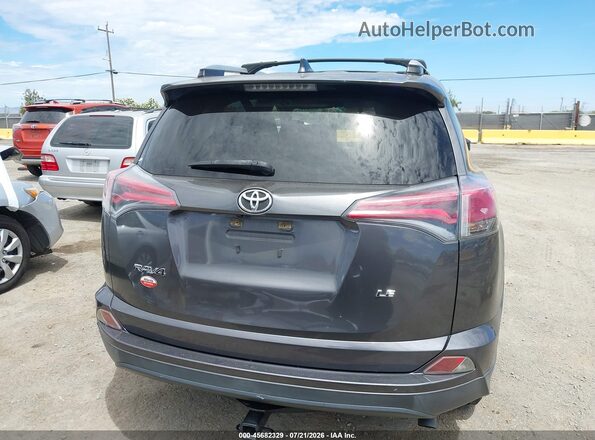 JTMZFREV8GJ077850 2016 TOYOTA RAV4 Gray 