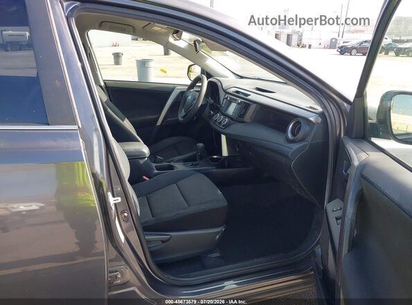 JTMZFREV8HJ103932 2017 TOYOTA RAV4 Серый Вид салона спереди