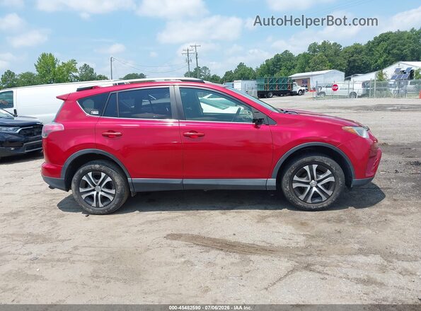 JTMZFREV8HJ119046 2017 TOYOTA RAV4 Red Вид задньої частини салону