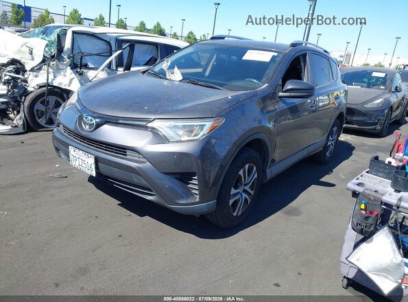 JTMZFREV9GJ066405 2016 TOYOTA RAV4 Gray Front left