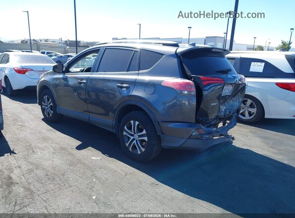 JTMZFREV9GJ066405 2016 TOYOTA RAV4 Gray Rear left