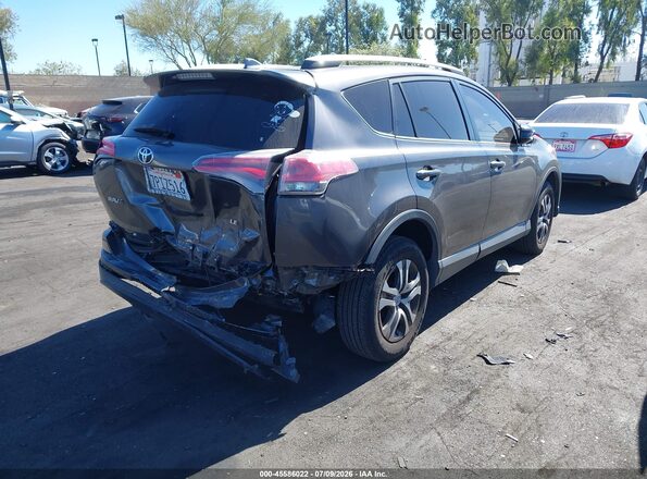 JTMZFREV9GJ066405 2016 TOYOTA RAV4 Gray Rear right