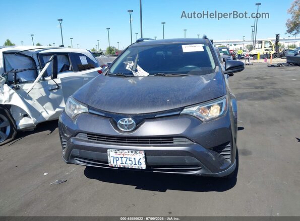 JTMZFREV9GJ066405 2016 TOYOTA RAV4 Gray Instrument cluster view