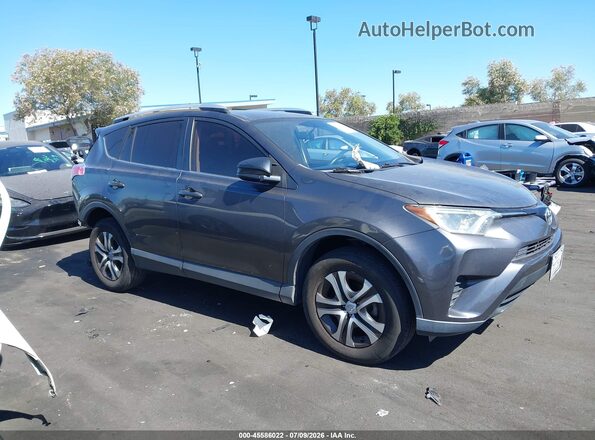 JTMZFREV9GJ066405 2016 TOYOTA RAV4 Gray Rear interior view