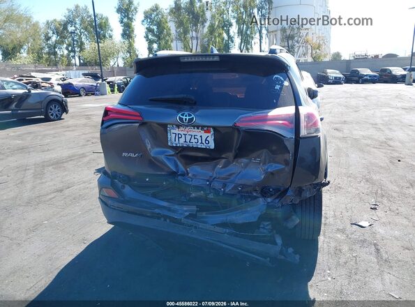 JTMZFREV9GJ066405 2016 TOYOTA RAV4 Gray 
