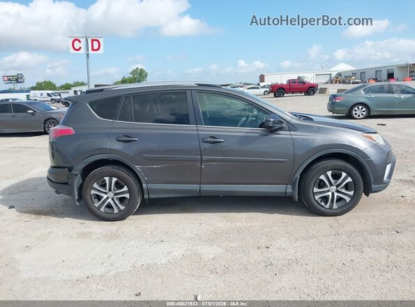 JTMZFREV9HJ118388 2017 TOYOTA RAV4 Gray Vista interior trasera