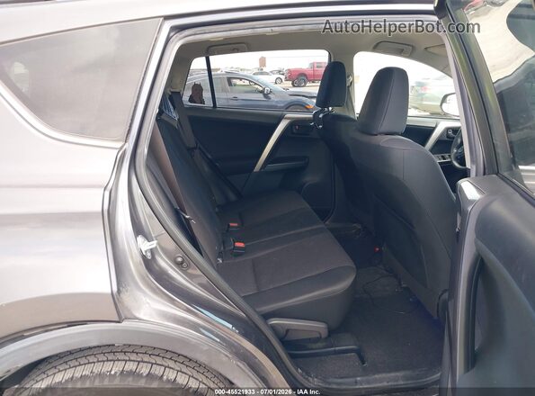 JTMZFREV9HJ118388 2017 TOYOTA RAV4 Gray Vista de la etiqueta del VIN