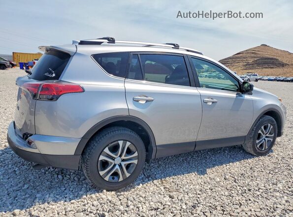 JTMZFREV9JD126253 2018 TOYOTA RAV4 Silver Հետևի աջ
