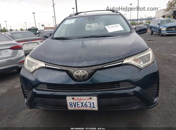 JTMZFREV9JJ174143 2018 TOYOTA RAV4 Blue Vista interior trasera