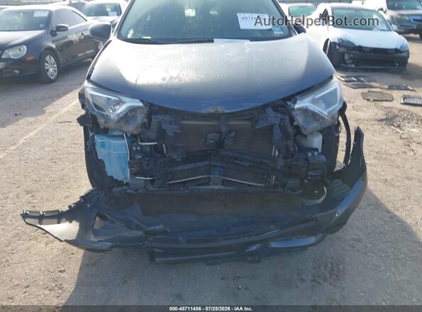 JTMZFREVXGD089531 2016 TOYOTA RAV4 Gray Front view
