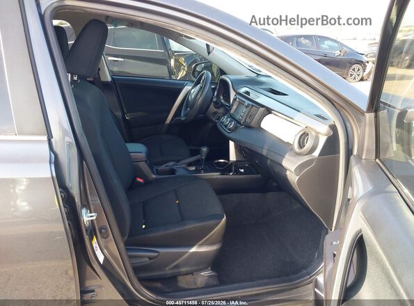 JTMZFREVXGD089531 2016 TOYOTA RAV4 Gray Front interior view