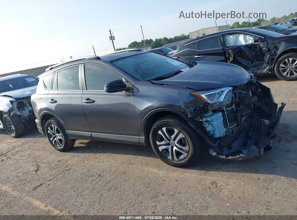 JTMZFREVXGD089531 2016 TOYOTA RAV4 Gray Rear interior view